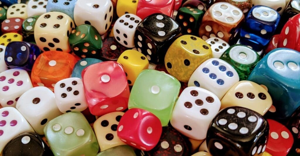 Reading challenge ideas: a jumble of colourful dice in different sizes
